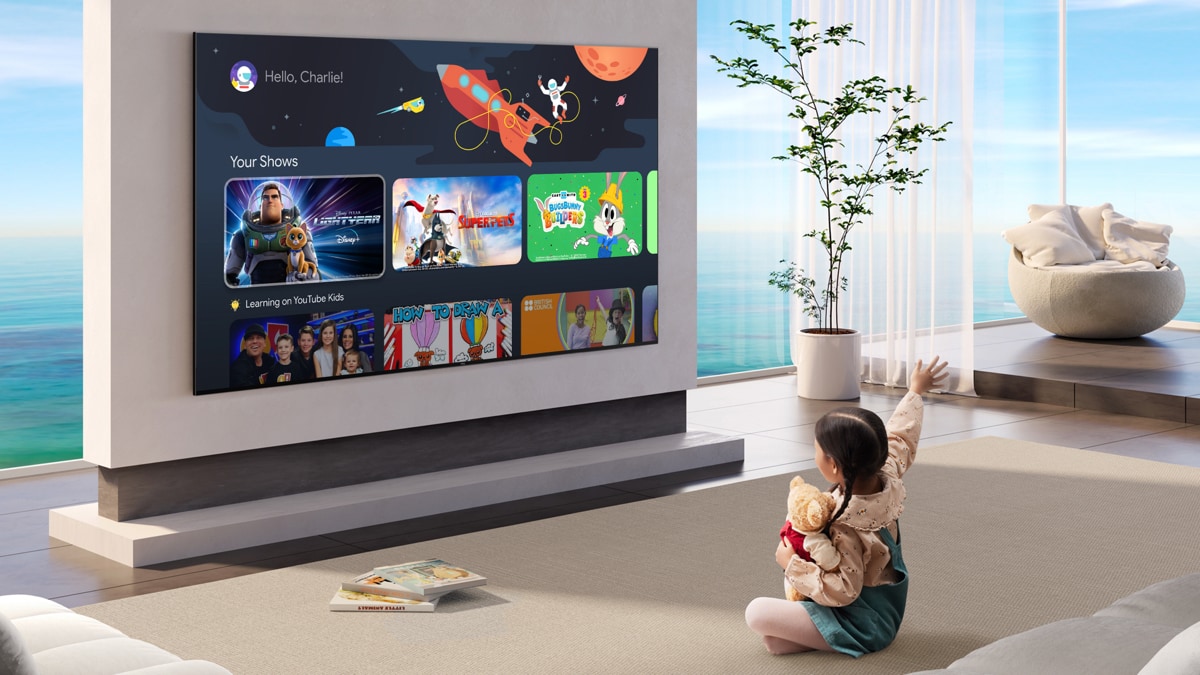 TCL C655 PRO QLED TV mounted on the wall